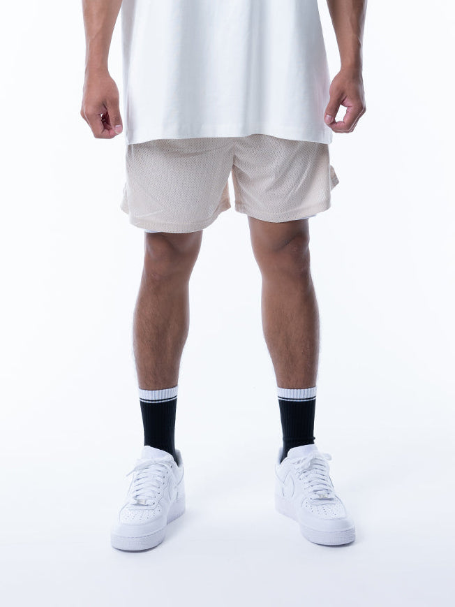 MESH SHORTS RUBBER TAG【BEIGE】