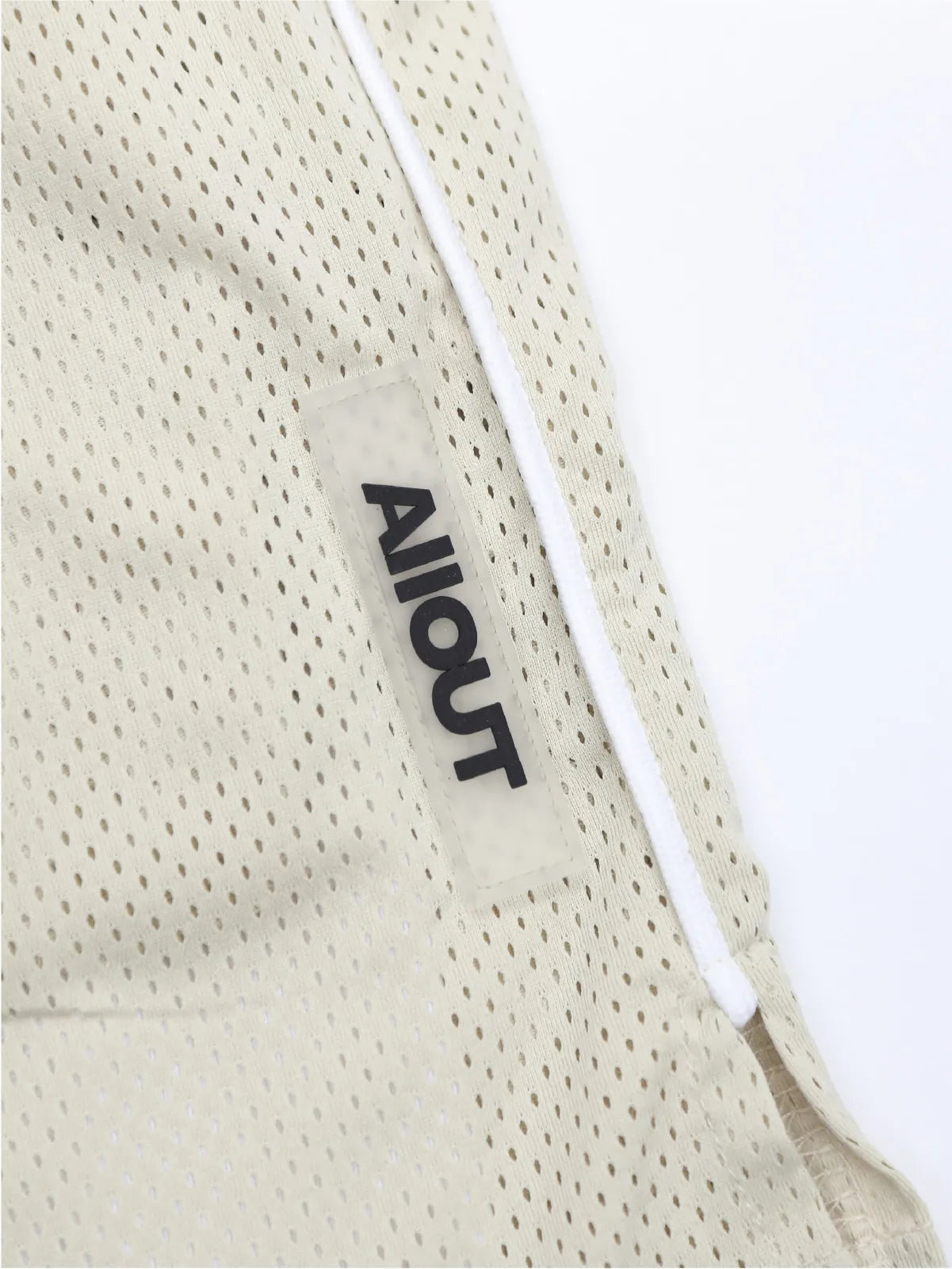 MESH SHORTS RUBBER TAG【BEIGE】