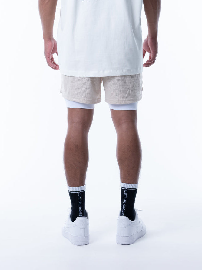 MESH SHORTS RUBBER TAG【BEIGE】
